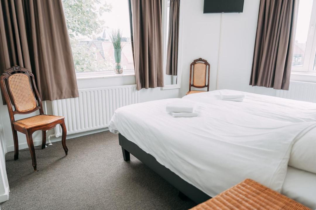 Basic Kamer met Gedeelde Badkamer (1 tot 2 Volwassenen)