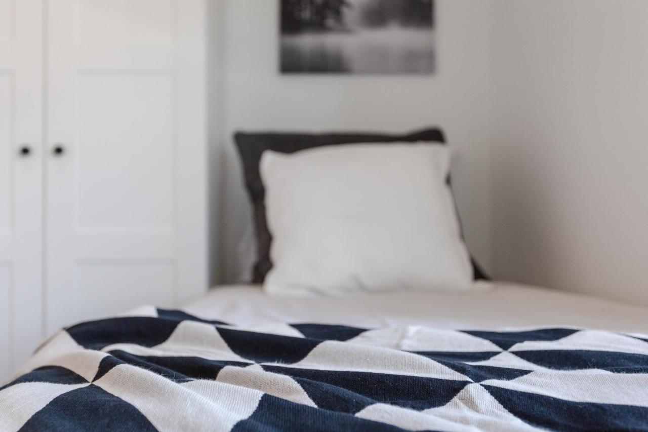 Kleine Tweepersoonskamer met 2 Aparte Bedden